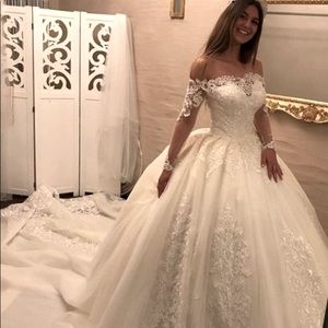Off shoulder weddings dress with Cathedral train and vail. Measurements in photo